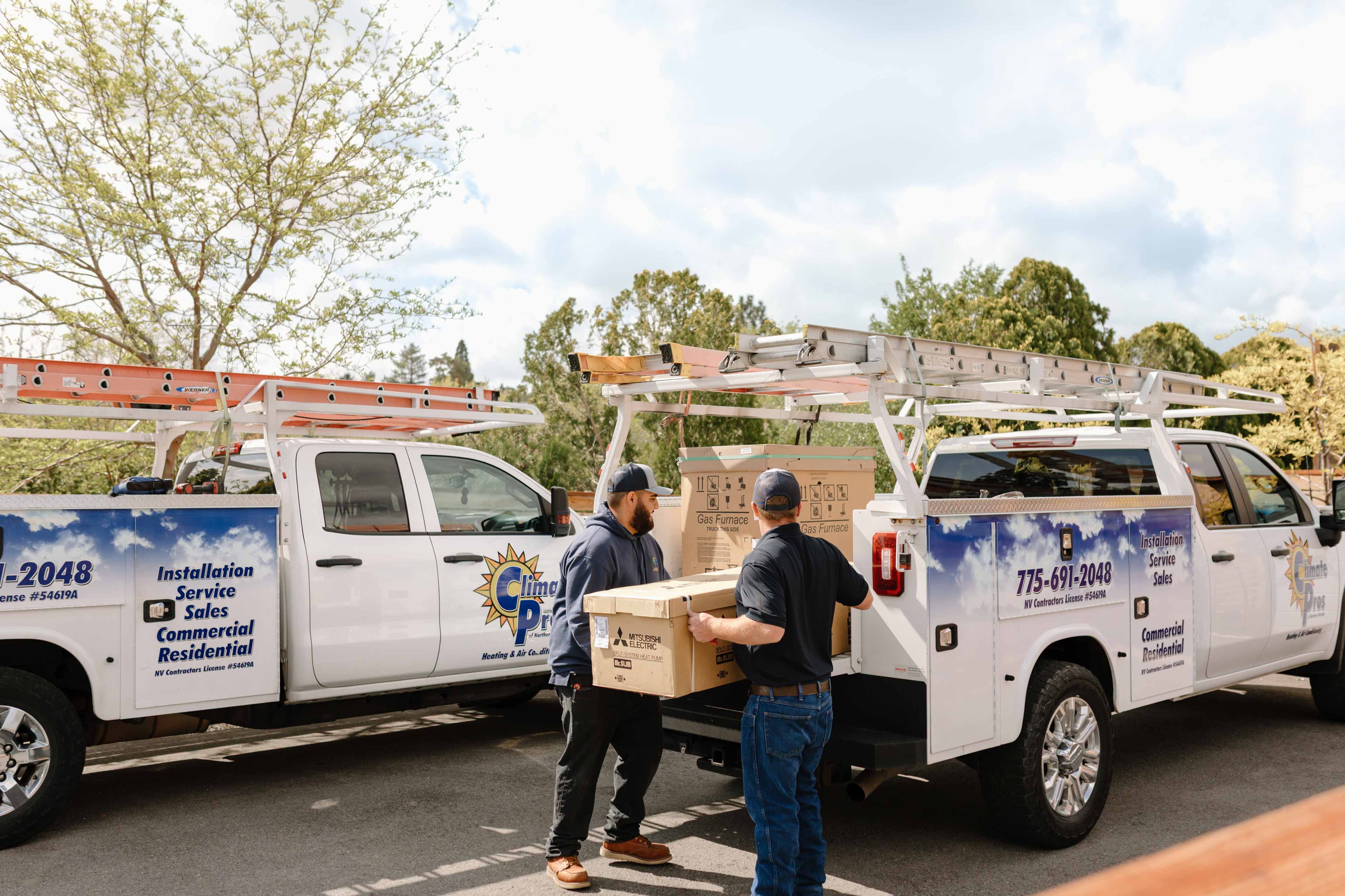 climate pros crew getting new equipment ready for installation