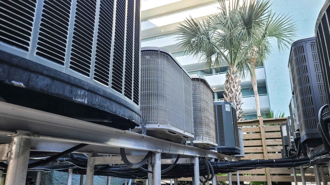 commercial-hvac-at-beach-condo-on-raised-platforms-for-easy-maintenance-and-rust-prevention
