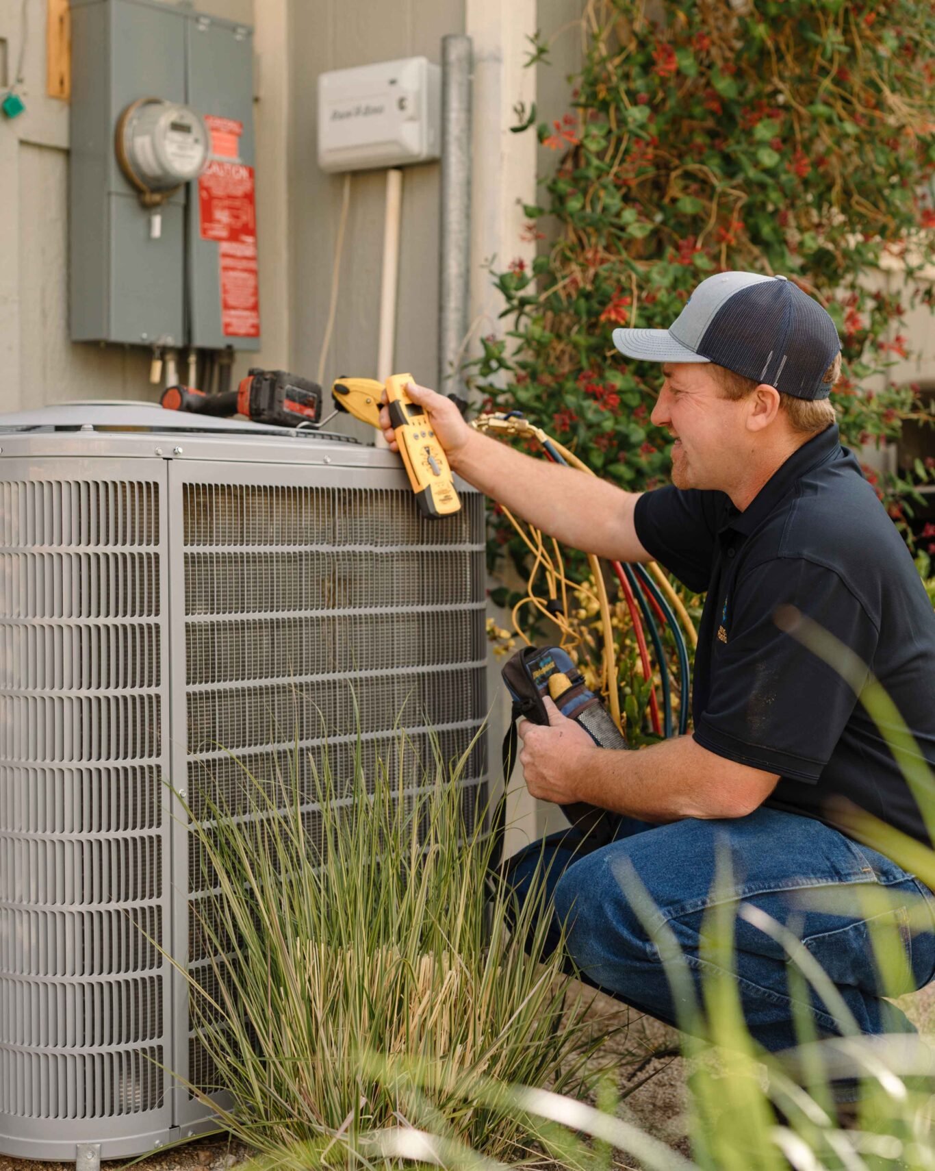 hvac-tech-doing-a-preventive-maintenace-round-on-a-swamp-cooler