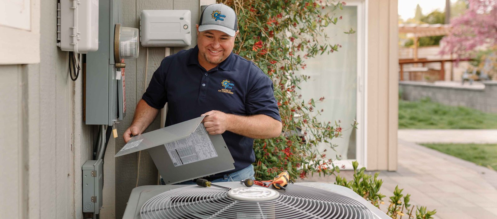 professional hvac tech doing an ac tune up