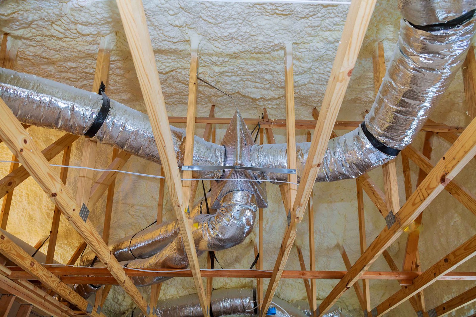 ducts installation of heating system on the roof of a residential house