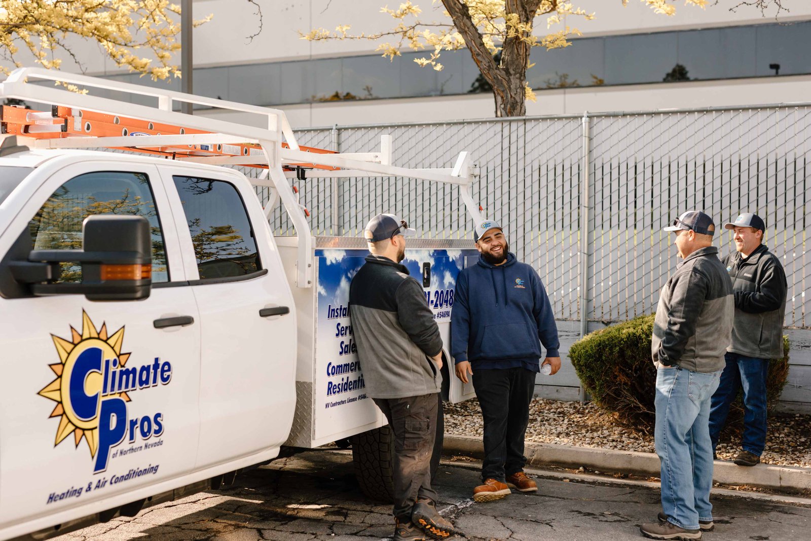 climate pros techs going to repair a central ac unit covered by warranty