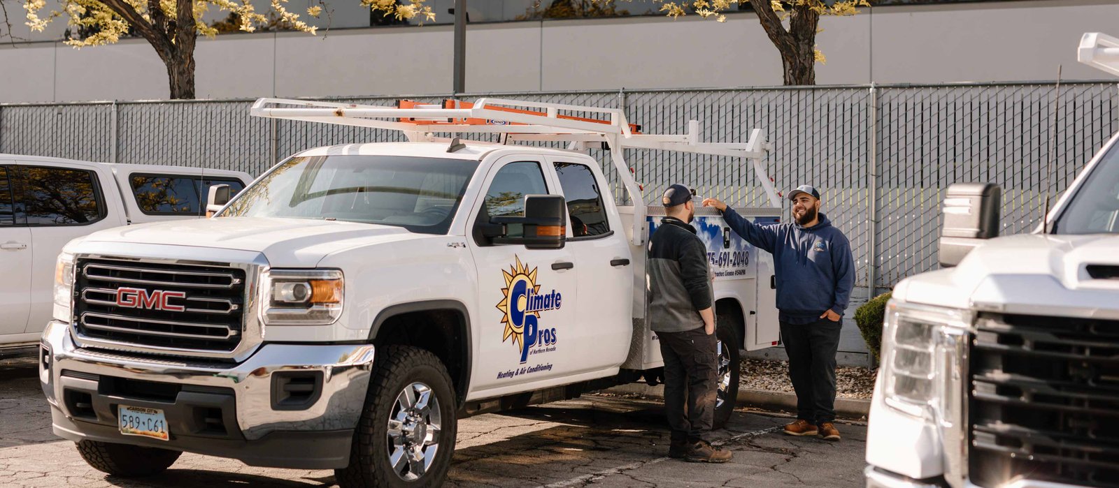 hvac techs going to a home warranty repair